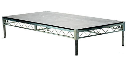 Stage rental setup showing size, height, stairs, and skirt options that affect pricing